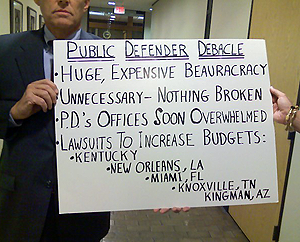 poster against public defender plan