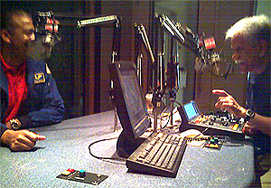 image of Pat Hernandez interviewing former astronaut Bernard Harris at the KUHF studio