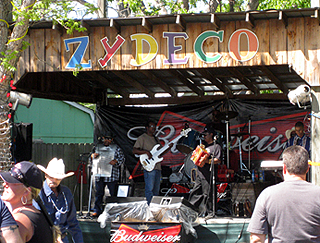 image of band playing at The Texas Crawfish and Music Festival