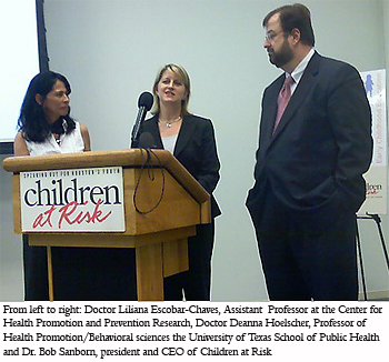photograph of From left to right: Doctor Liliana Escobar-Chaves, Assistant  Professor at the Center for Health Promotion and Prevention Research, Doctor Deanna Hoelscher, Professor of Health Promotion/Behavioral sciences the University of Texas School of Public Health and Dr. Bob Sanborn, president and CEO of Children at Risk