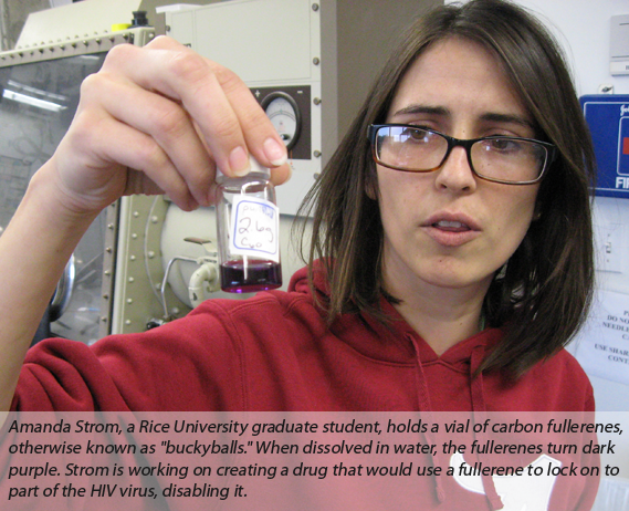 Amanda Strom, a Rice University graduate student, holds a vial of carbon fullerenes, otherwise known as 'buckyballs.'