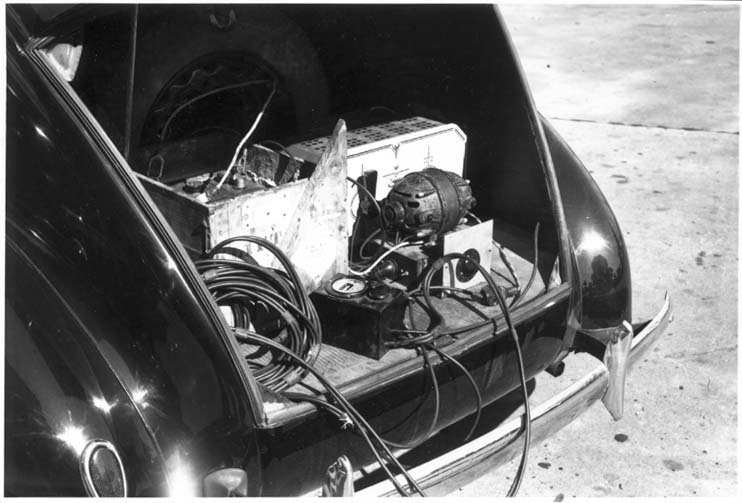 open trunk showing recording equipment