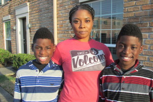 Mom Shavonda Collins stands with her twin boys, Tyler and Tylan
