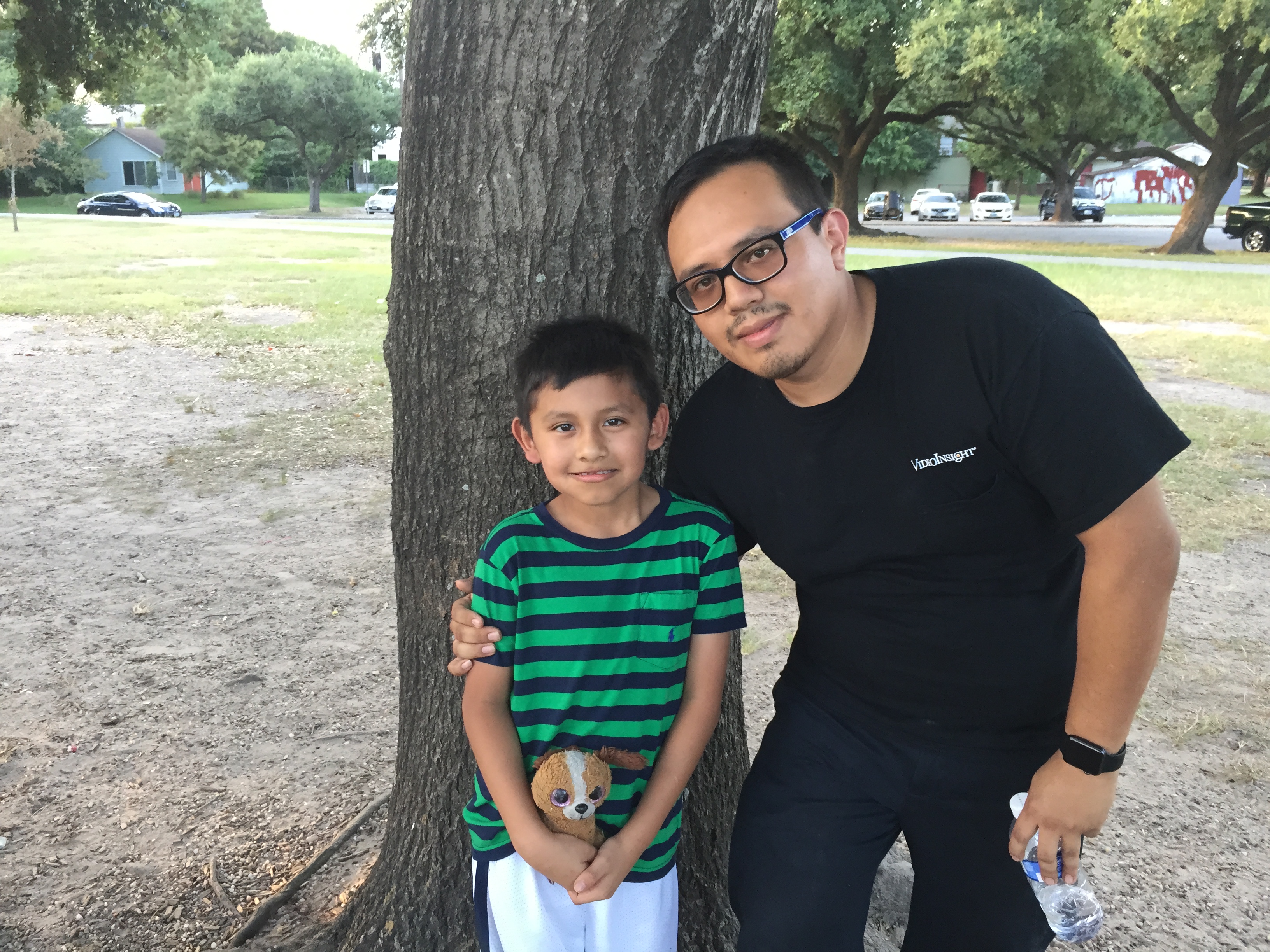 Fernando Aguilar stands with his son Isaac at Stude Park.