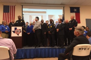 Houston Police Chief Charles McClelland stands onstage along with other public officials, speaking in support of the Pray for Police campaign.