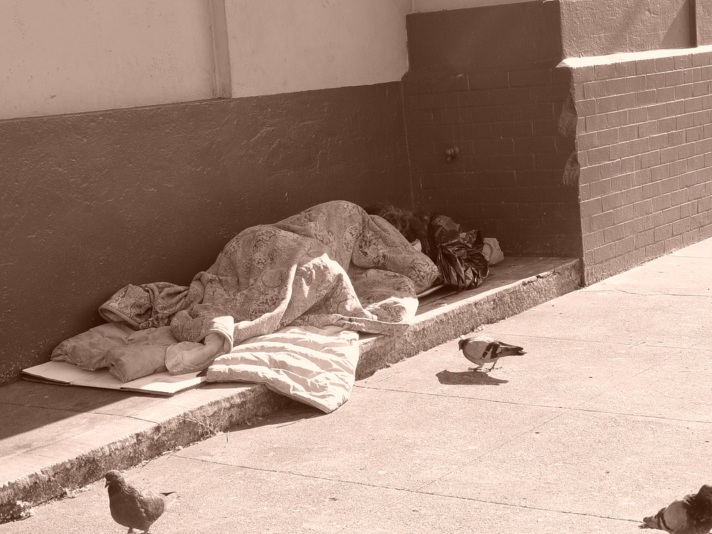 Homeless sleeping on the sidewalk