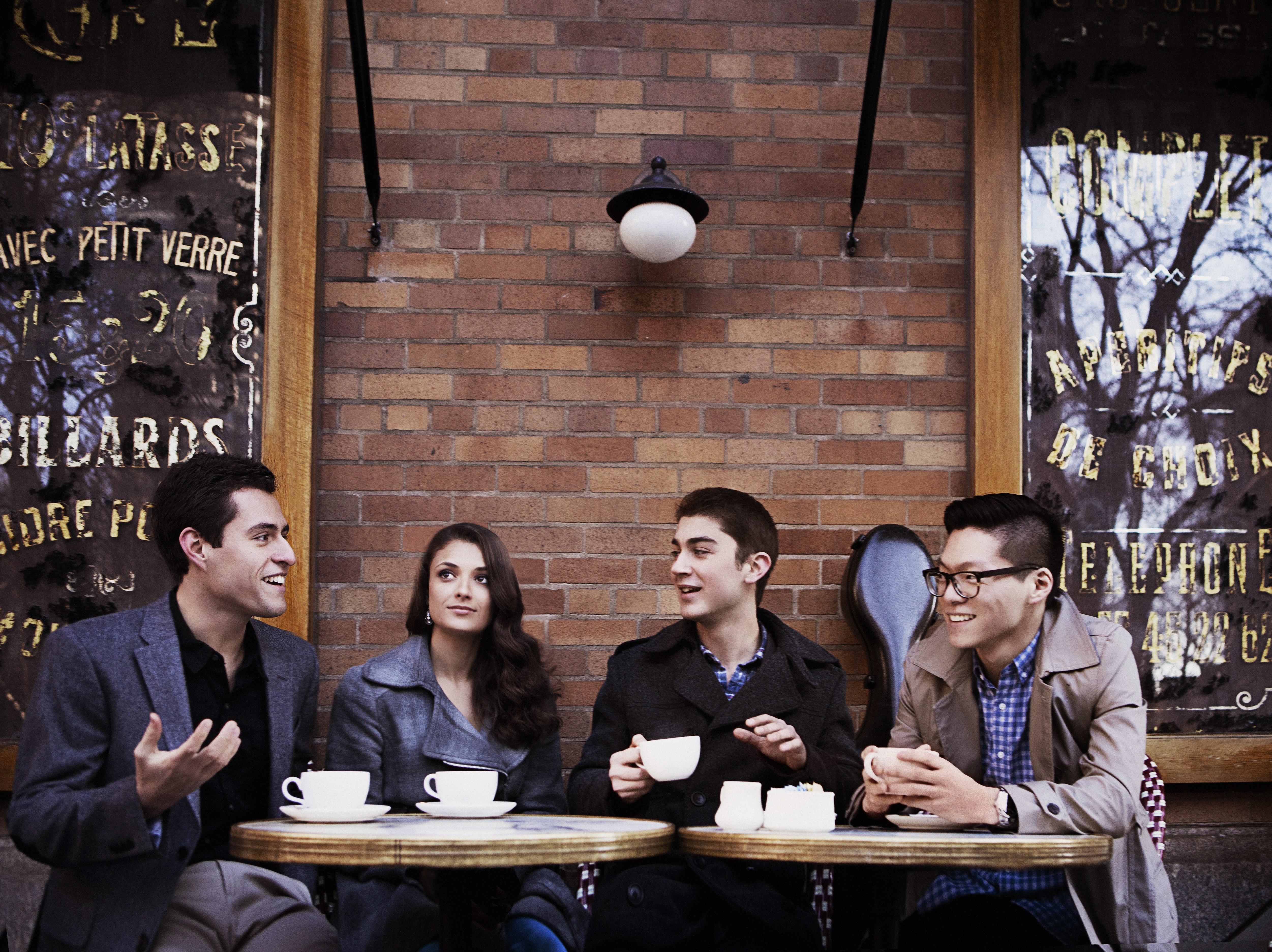 Dover Quartet sitting for coffee in Manhattan
