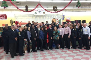 Houston Police pose for a picture with Fiesta staff and volunteers.