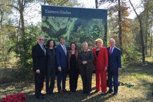 Houston Mayor Annise Parker stands with other city leaders in front of a rendering of the Eastern Glades.