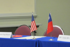 The flags of the United States and Taiwan stand side by side at a press conference to formalize a partnership between HISD and Taipei's education system.