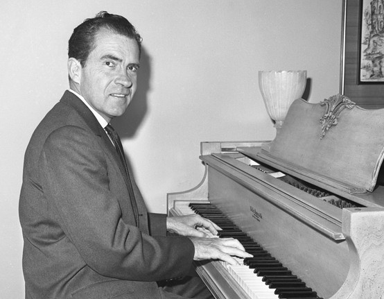 Richard Nixon playing piano in Beverly Hills, Calif., 1962