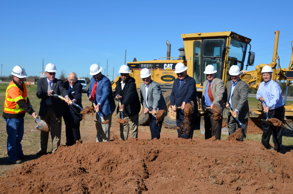 Officials in Fort Bend County turn shovels at last month's groundbreaking for the FM 1093-Westpark Tollway Extension project. 