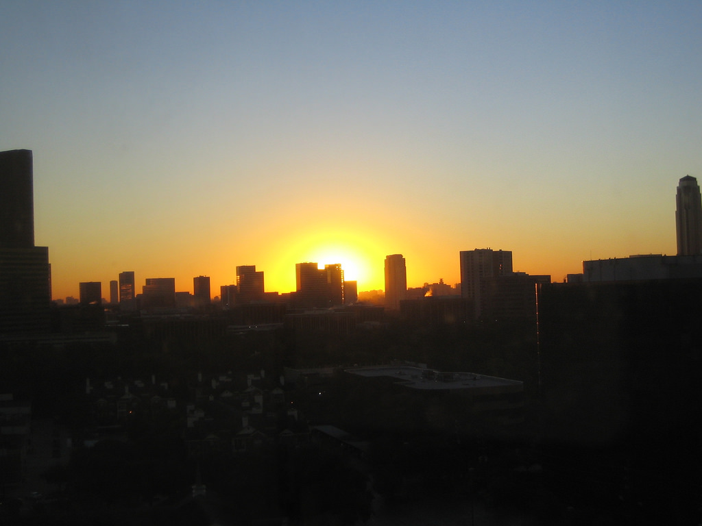 Sun rising over the Houston skyline