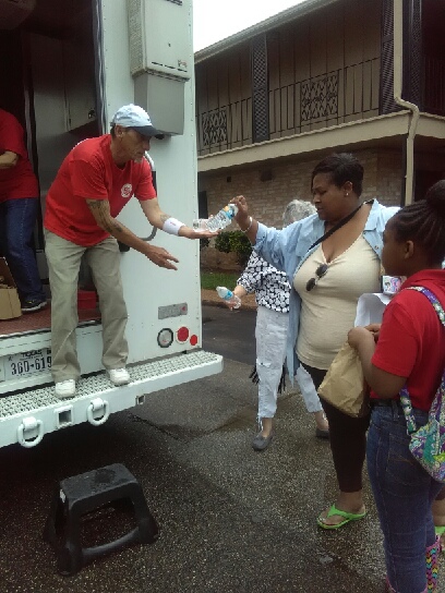 Delivering essential food items to flood victims. 
