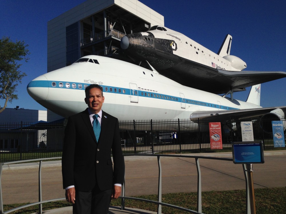 William Harris has just started as the new CEO at Space Center Houston. He says Independence Plaza, which appears in the backdrop displaying a replica of NASA's Independence space shuttle mounted on top of the original NASA 905 shuttle carrier aircraft, is one of the biggest draws in the complex.