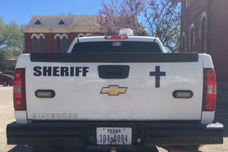 Christian cross displayed on truck