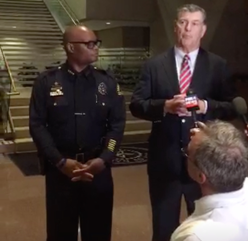 Dallas Police Chief David Brown (Left) and Dallas Mayor Mike Rawlings speak to reporters following the shooting of multiple officers in downtown Dallas.