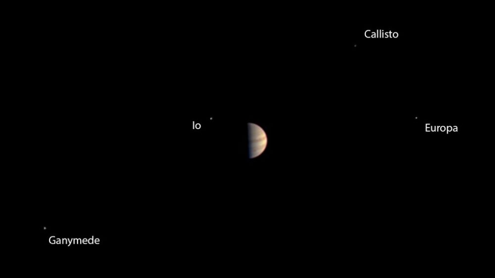 Before turning all of its attention to an orbit insertion at Jupiter, the Juno craft took this image of its target planet and surrounding moons.