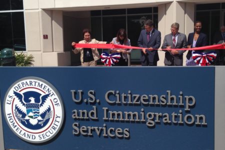 Daniel Renaud, USCIS Associate Director of Field Operations, and other agency personnel did the traditional ribbon cutting at the new Houston field office, which is located at 810 Gears Road, in the north part of town.