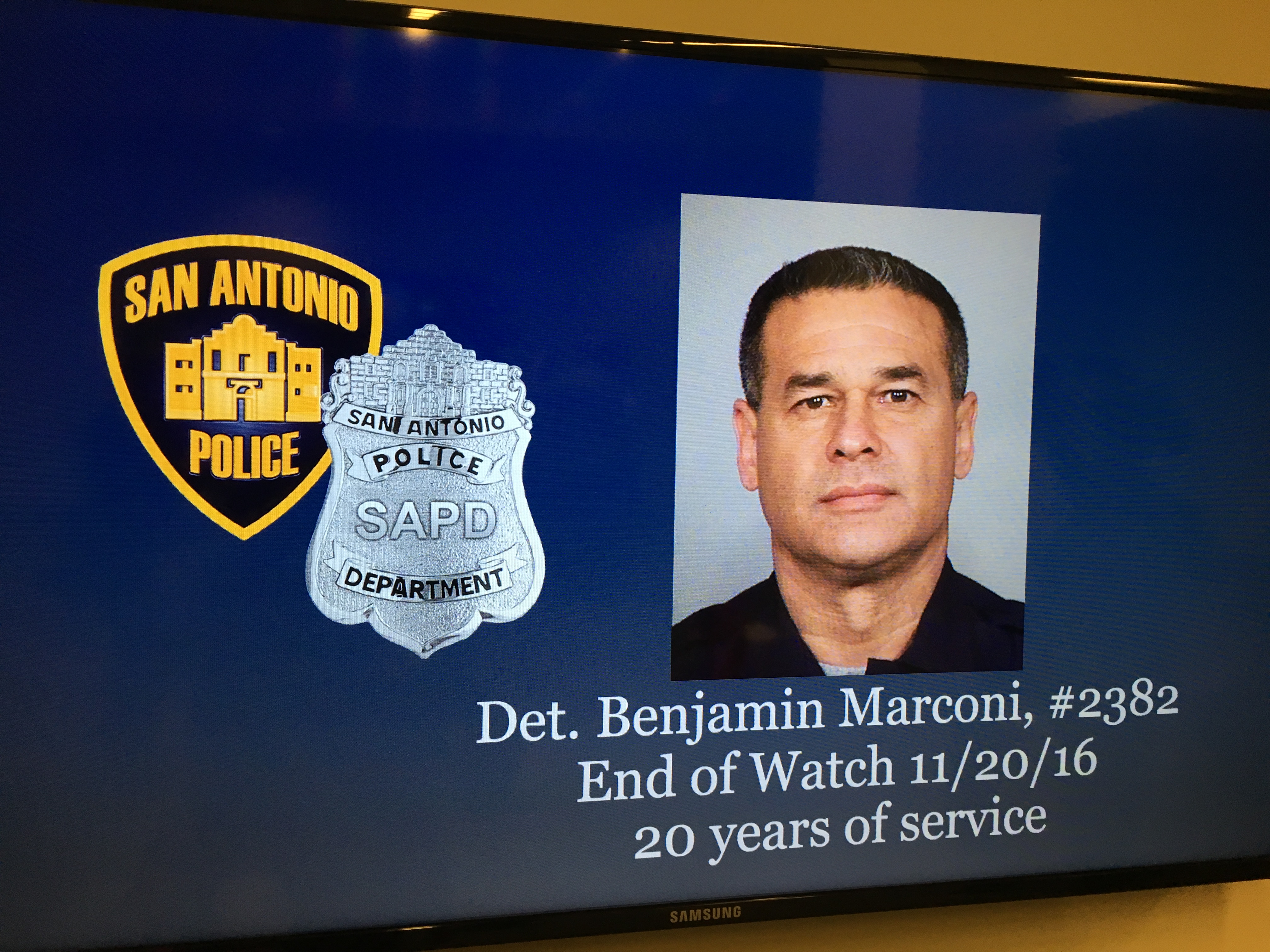 Police have identified 20-year veteran Det. Benjamin Marconi as the officer fatally shot by a gunman Sunday. 