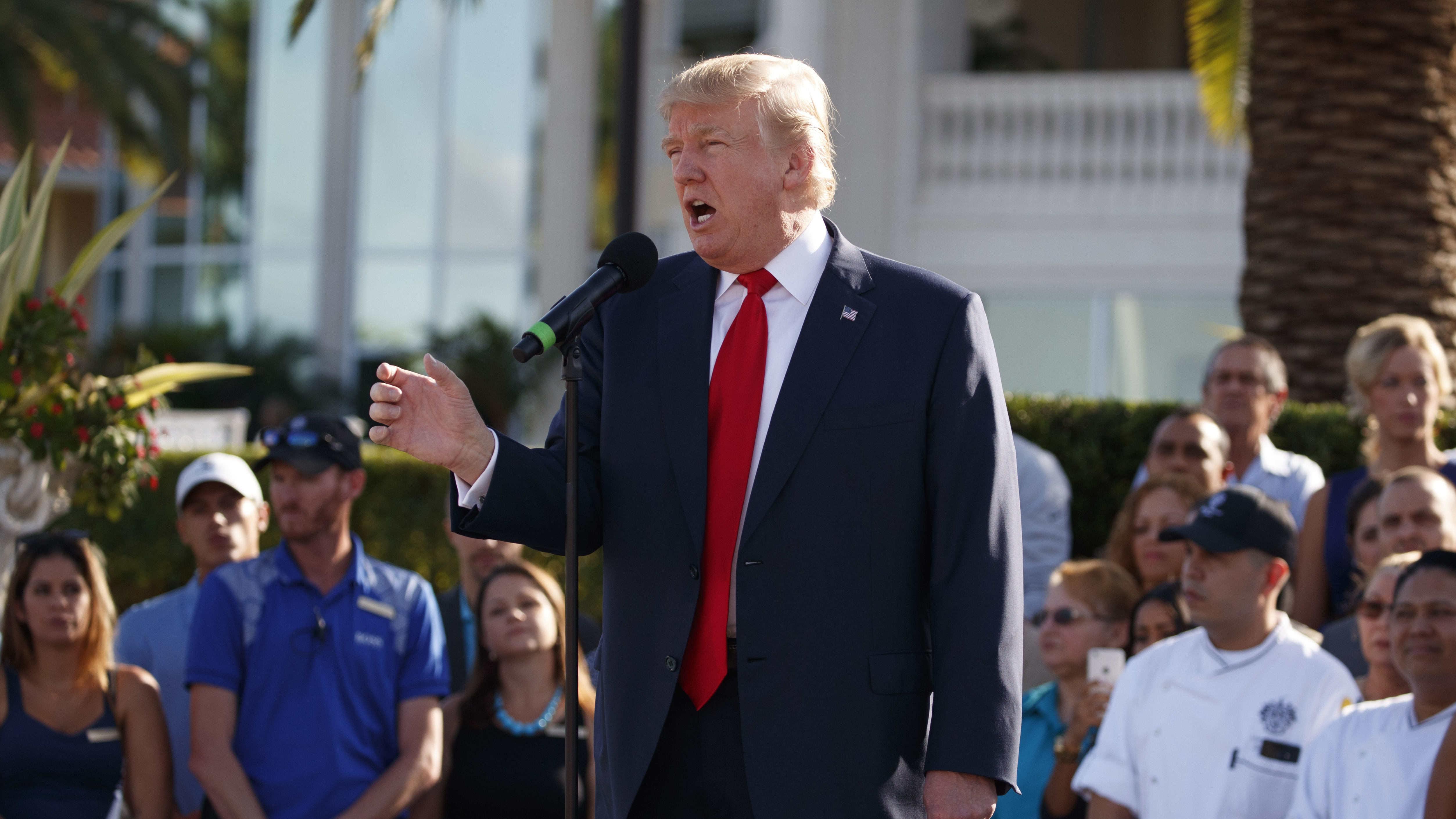 Trump speaks at his National Doral golf club in Florida. He repeatedly showcased his properties and hotels throughout the presidential campaign. 