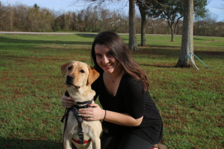High school junior Serena Maher wanted to bring her service dog Max to school after the winter break. The Fort Bend Independent School District delayed his arrival to notify other students.