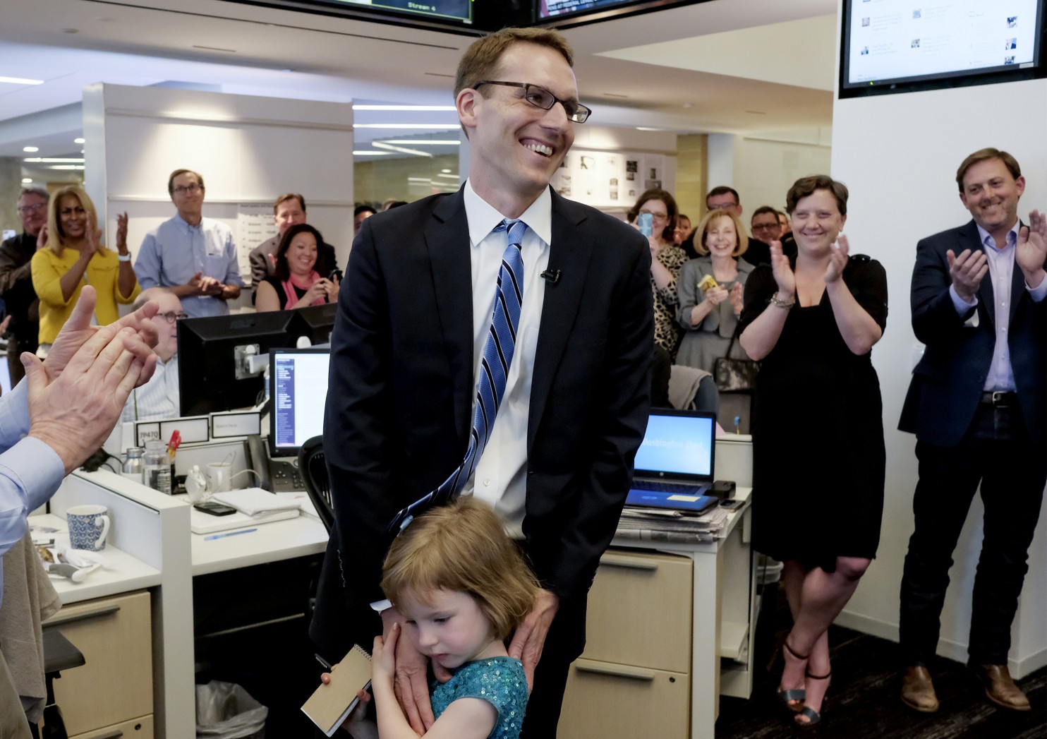 David Fahrenthold reacts to the announcement that he won the Pulitzer Prize for National Reporting at The Washington Post. (Photo Courtesy: Bonnie Jo Mount/Washington Post)