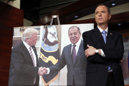 Rep. Adam Schiff, D-Calif., ranking member of the House Intelligence Committee stands next to a photograph of President Donald Trump and Russian Foreign Minister Sergey Lavrov, during a news conference on Capitol Hill in Washington, Wednesday, May 17, 2017.