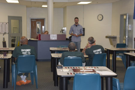 Adam Wilson leads a counseling session at the Montgomery County jail as part of the V.E.T.S. program.