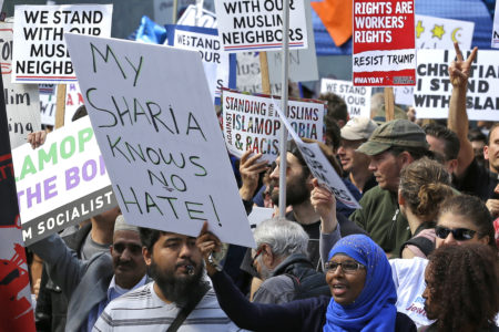 Counter-protesters respond to the "anti-sharia" rally in Seattle on Saturday.