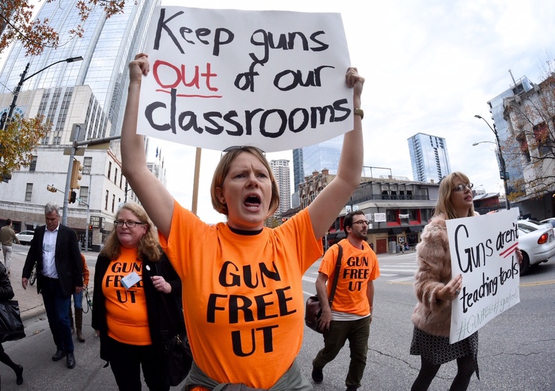 Stephanie Odam of Austin marches in a campus carry protest in Austin, Jan 8, 2015.
