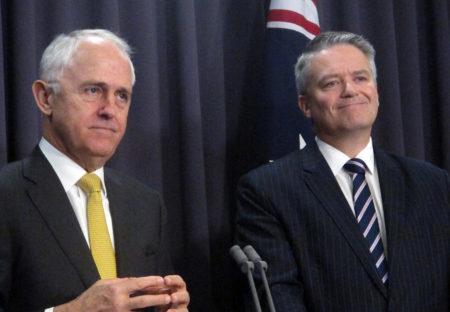 Australian Prime Minister Malcolm Turnbull (left) says Parliament could legalize same-sex marriage this year if the nation's voters endorse it. He spoke about the issue on Tuesday with Finance Minister Mathias Cormann at Parliament House in Canberra.