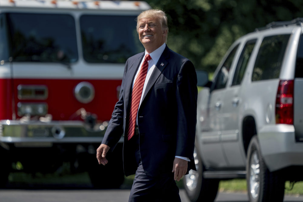 President Donald Trump walks across the South Lawn of the White House in Washington, Tuesday, Aug. 22, 2017, to board Marine One  for a short trip to Andrews Air Force Base, Md. and then onto Yuma, Ariz. to visit the U.S. border with Mexico and attend a rally in Phoenix. 