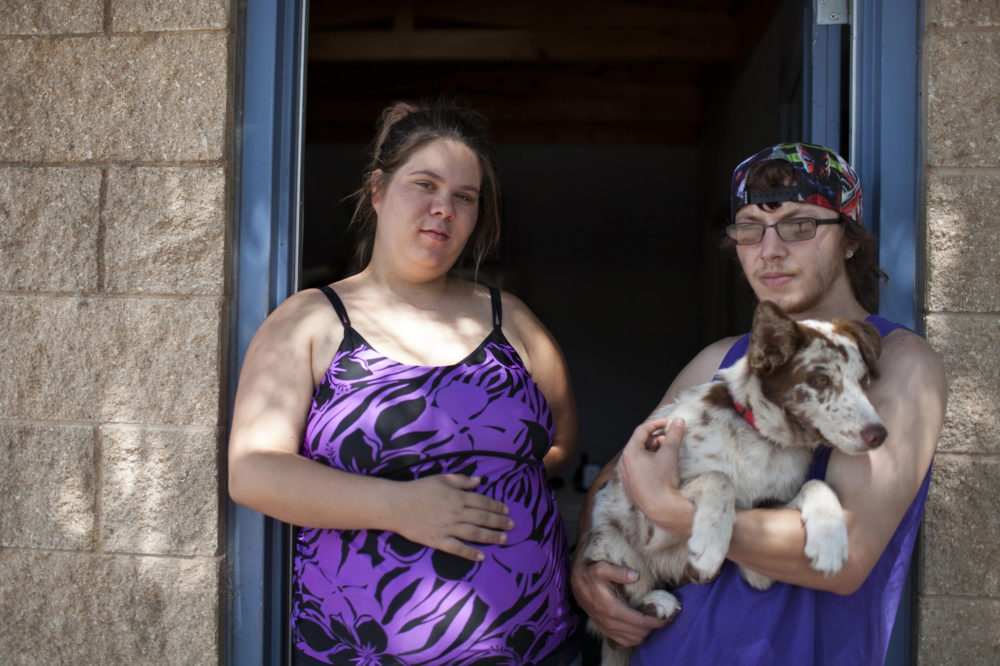 Baylee Jackson (left) and Kyle Proctor, evacuated from Corpus Christi on Aug. 25, as Hurricane Harvey was making landfall on the Texas coast. The couple, who are expecting their first child on Sept. 20, say that the people at Inks Lake State Park have been very helpful. Volunteers have brought baby clothes and have helped the couple find a doctor for Baylee.