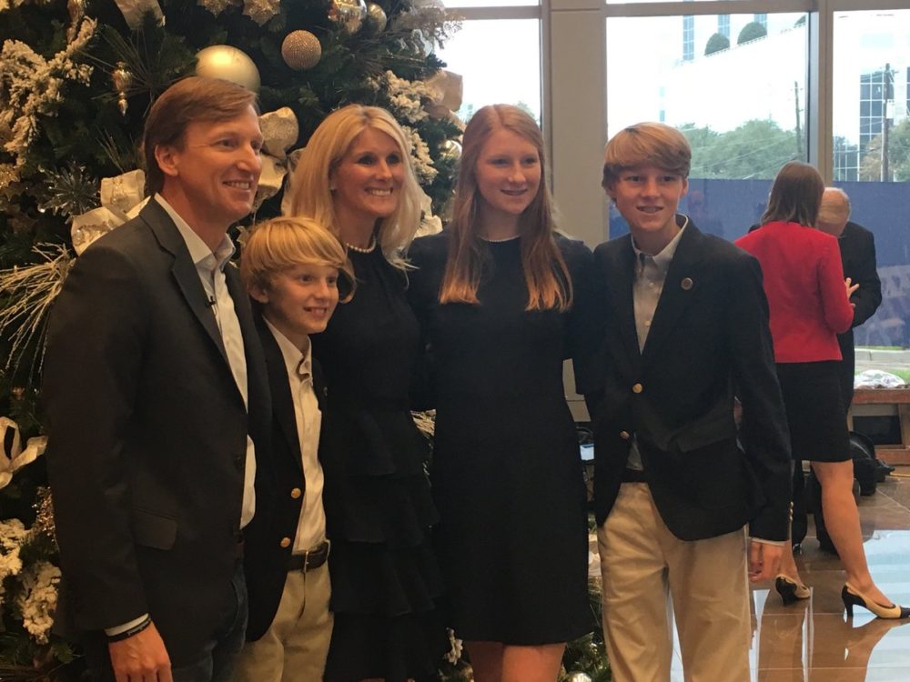 Andrew White poses with his family moments before announcing his candidacy during a press event held in Houston on December 7, 2017.