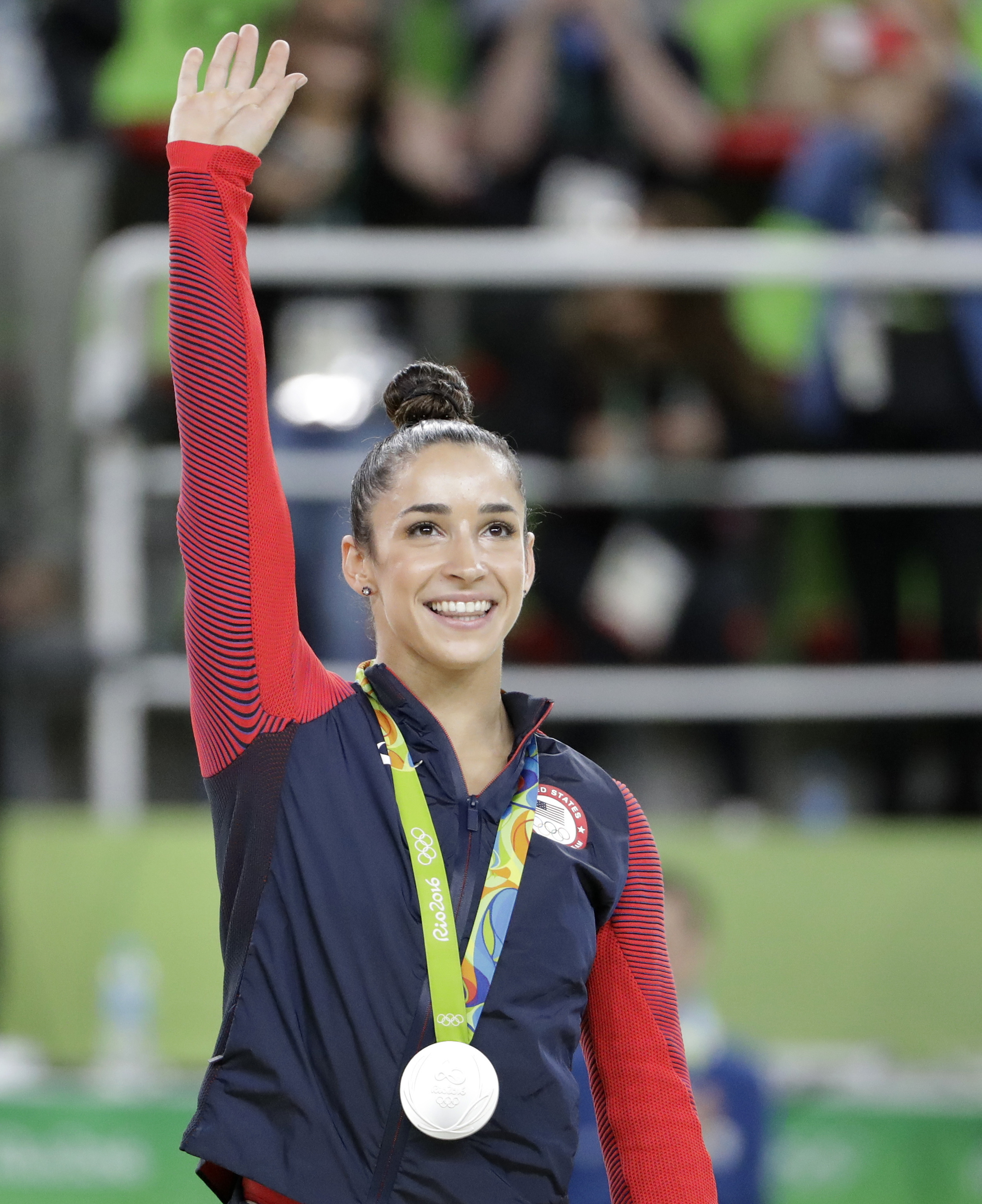 Six-time Olympic medalist Aly Raisman names the U.S. Olympic Committee and USA Gymnastics in a lawsuit this week alleging the organizations hid abuse by disgraced team doctor Larry Nassar. She is seen here at the 2016 Games in Rio de Janeiro, Brazil.

