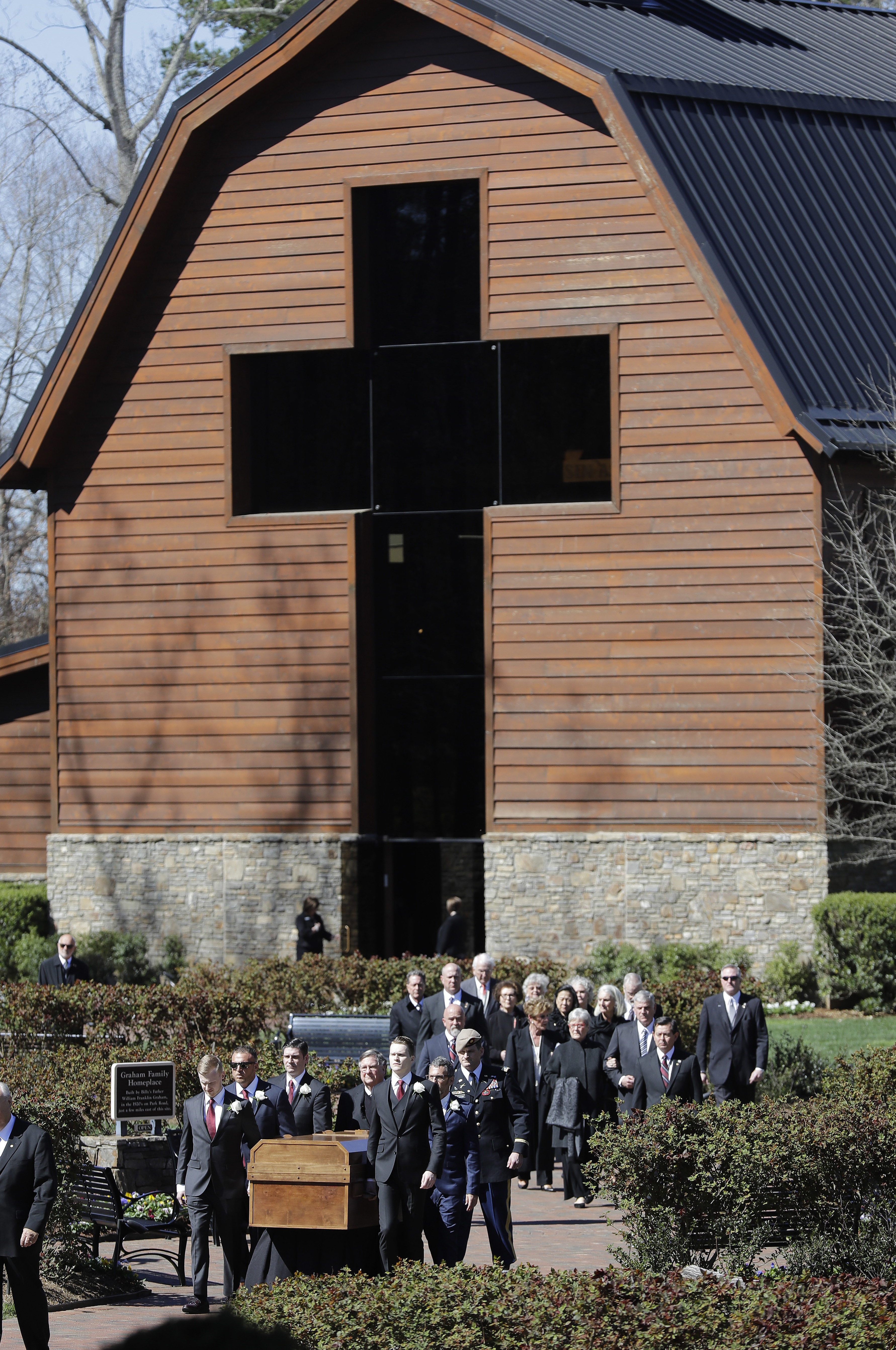 The casket of the Rev. Billy Graham is moved during his funeral service at the Billy Graham Library on Friday in Charlotte, N.C.
