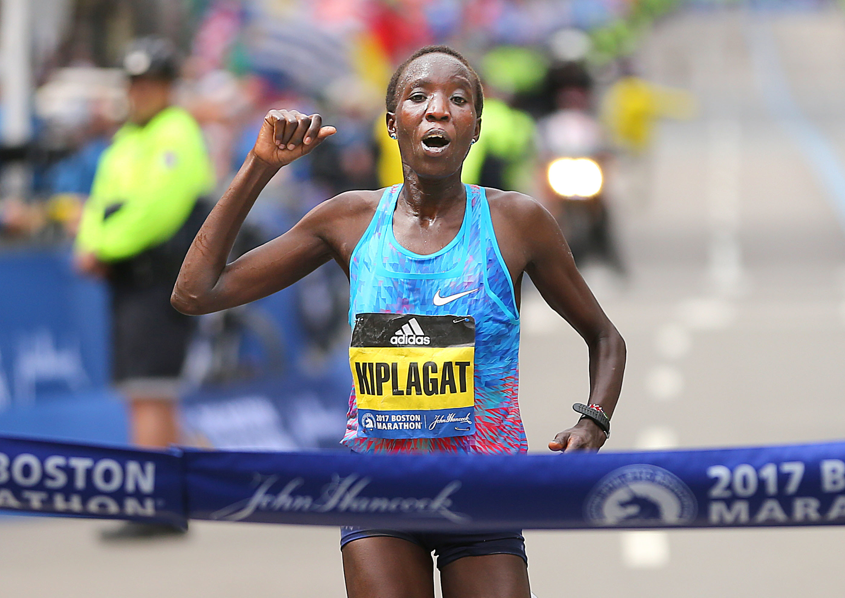 Edna Kiplagat crosses the finish line of the 121st Boston Marathon on April 17. It was her first time running the race.
