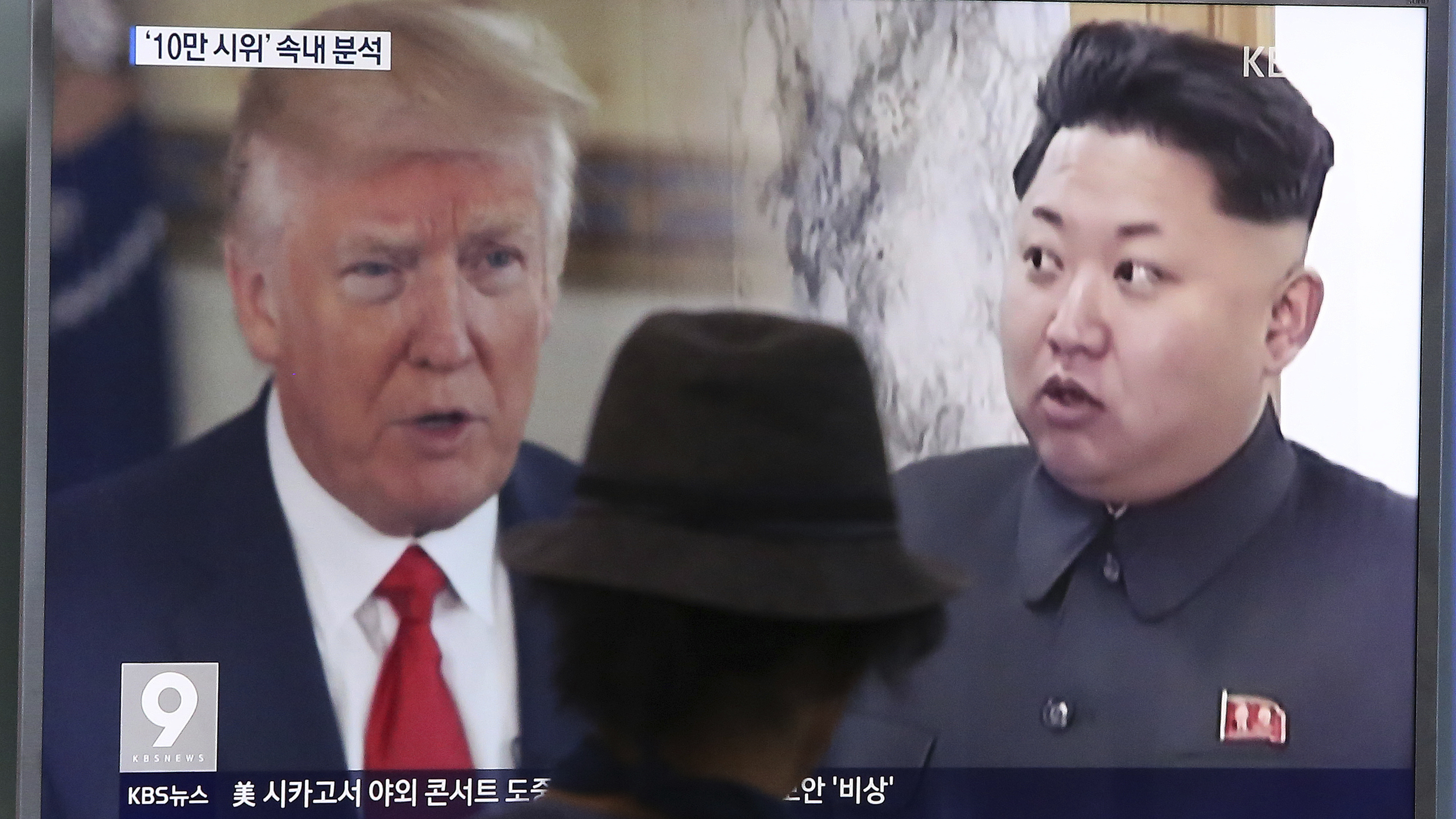 A man at the Seoul, South Korea, train station last August watches a news program featuring President Trump and North Korean leader Kim Jong Un.