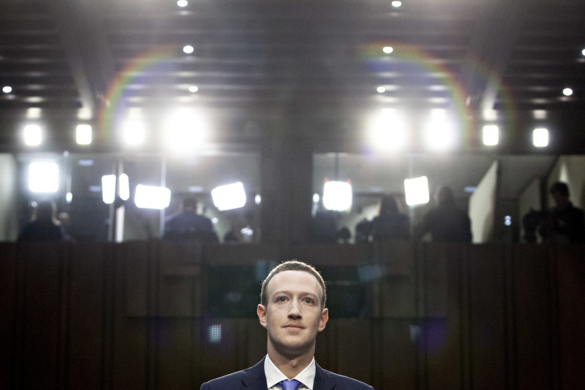 Mark Zuckerberg, chief executive officer and founder of Facebook Inc., listens during a joint hearing of the Senate Judiciary and Commerce Committees in Washington, D.C., U.S., on Tuesday, April 10, 2018. Zuckerberg said Tuesday that his company is cooperating with Special Counsel Robert Mueller in his investigation of Russian interference in the 2016 presidential election. Photographer: Andrew Harrer/Bloomberg via Getty Images