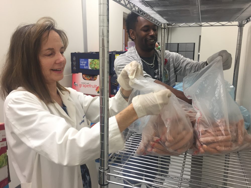 Carolyn Moore, professor of nutrition and food science at TWU, donated over $10,000 of her own money to build the student market at TWU. She's advising graduate student Torrey Alexis on his masters project that's monitoring how the food scholarships impact students' nutrition.