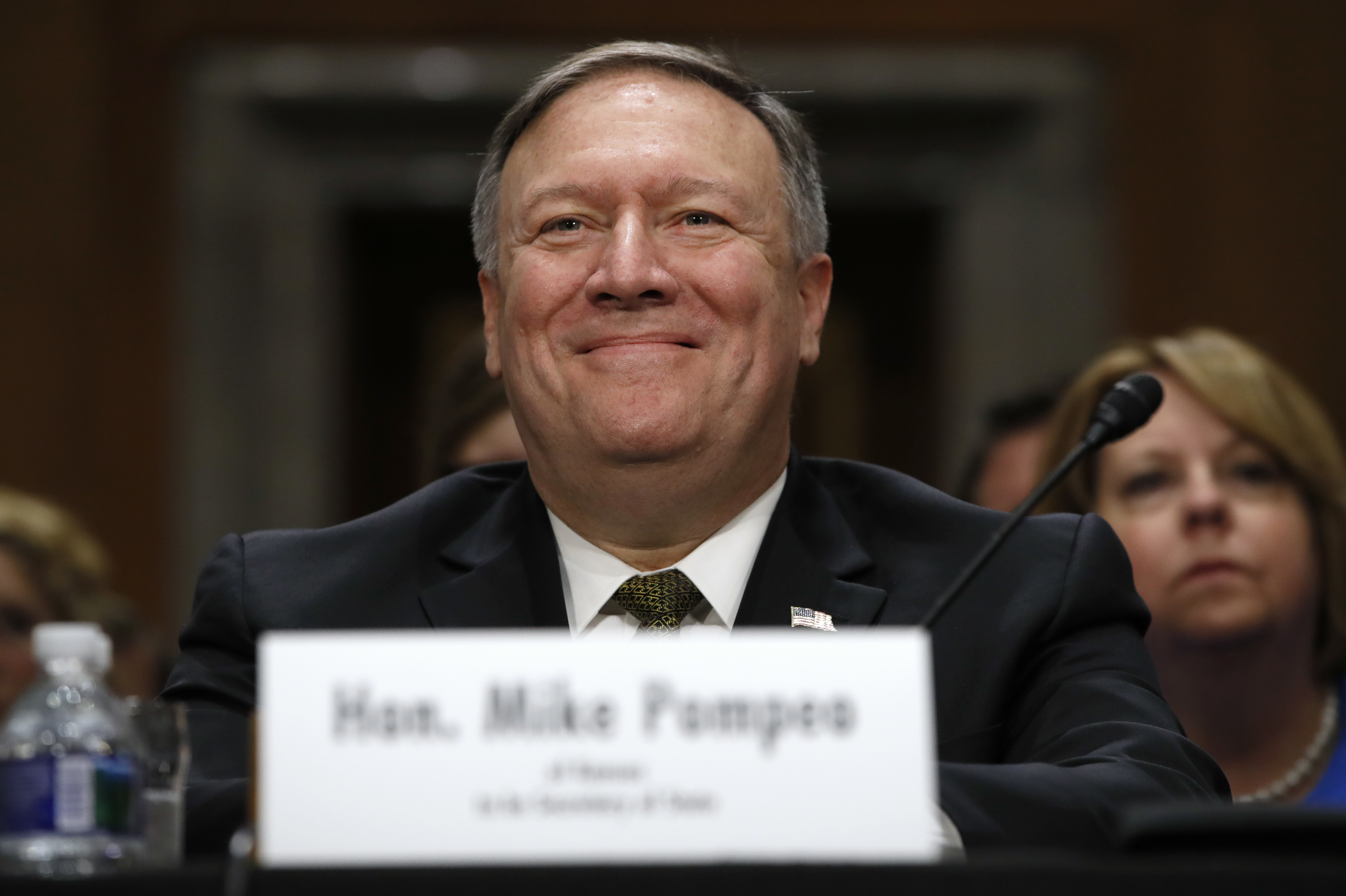Secretary of State-designate Mike Pompeo smiles after his introduction before the Senate Foreign Relations Committee during a confirmation hearing on April 12 on Capitol Hill.