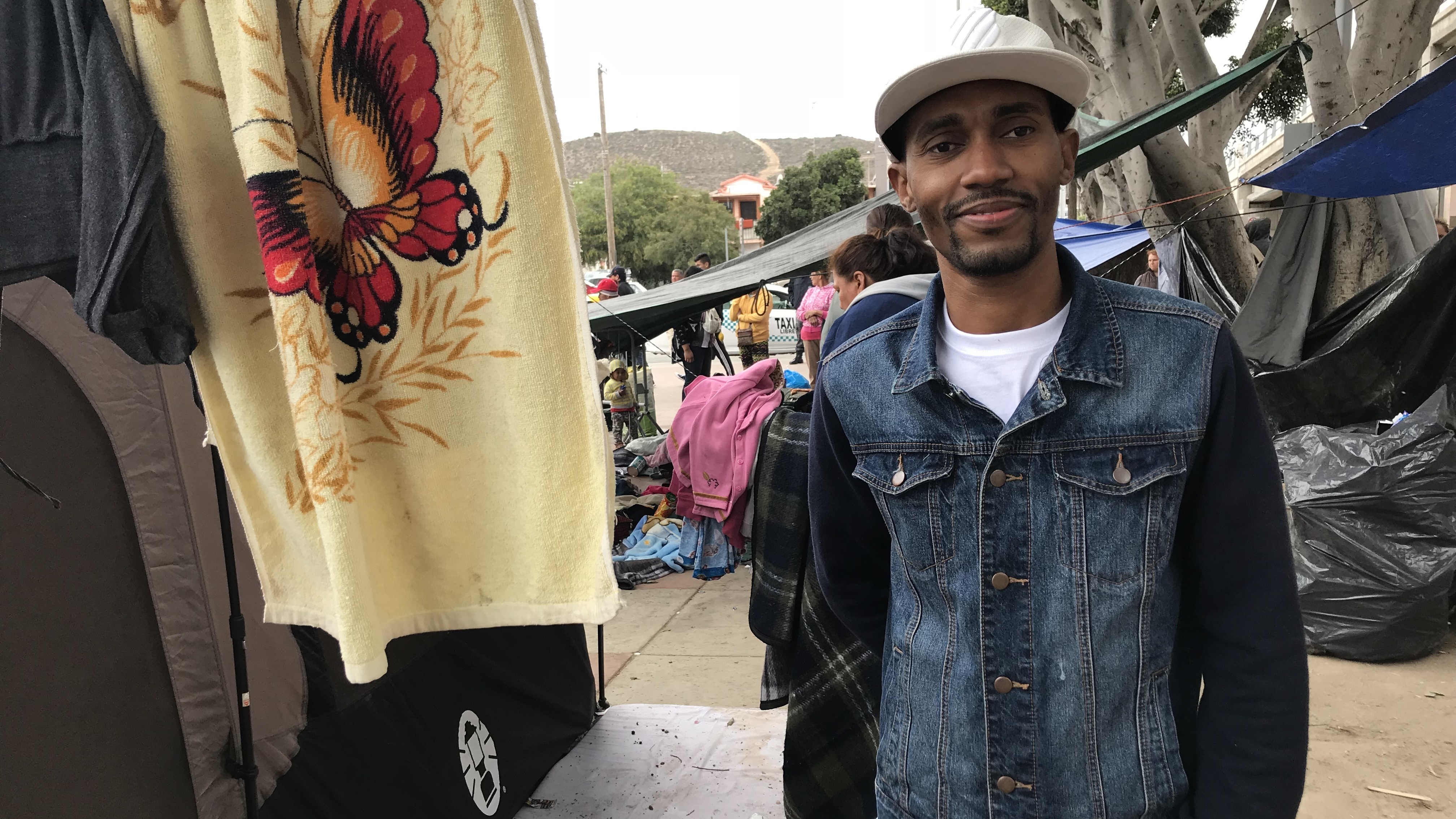 Jean Stevenson Dorvil, originally from Haiti, spent six months trying to reach Tijuana from Venezuela where he had been living. He hopes to be granted political asylum by the United States, but he's been waiting on the Mexican side for the past six months with no word from authorities of his fate.
