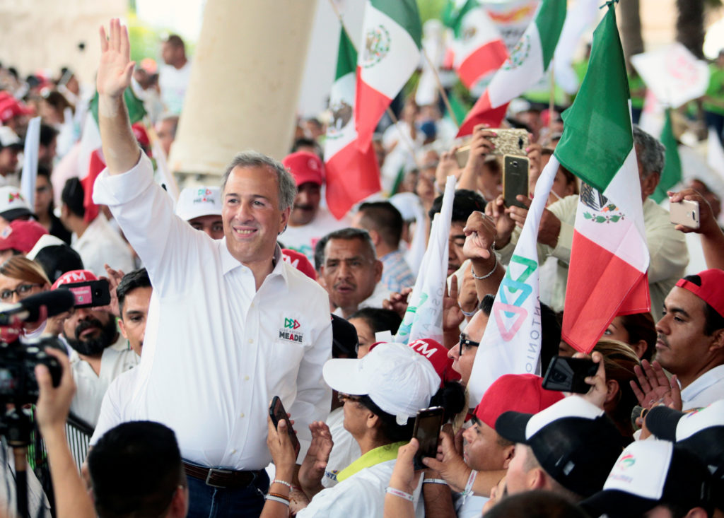 Mexican presidential candidate Jose Antonio Meade greets supporters during a campaign rally, in Saltillo, Mexico. 