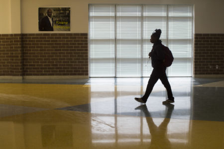A Worthing High School student walks between classrooms on Thursday, April 5, 2018, in Houston. ( Marie D. De Jesus / Houston Chronicle )