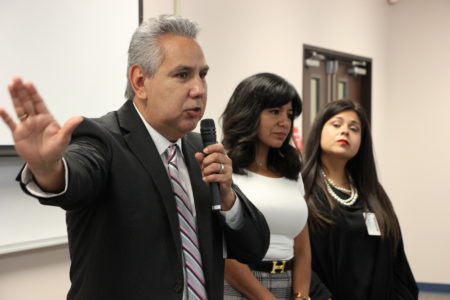 HISD Trustees Sergio Lira, Diana Dávila and Elizabeth Santos speak at a community meeting where local leaders and parents gave their input on the superintendent search. Last fall, the three trustees voted to abruptly fire the current interim superintendent, Grenita Lathan.