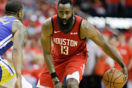 James Harden dribbles with an injured eye