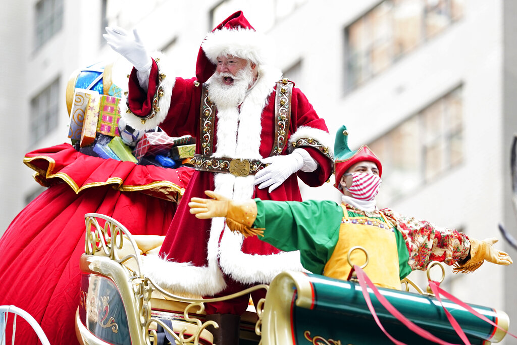 Santa Claus rides a float in the Macy's Thanksgiving Parade.