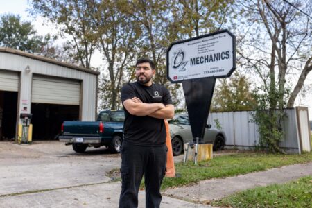 Azael Seuplveda stands outside of his garage, Oz Mechanics..