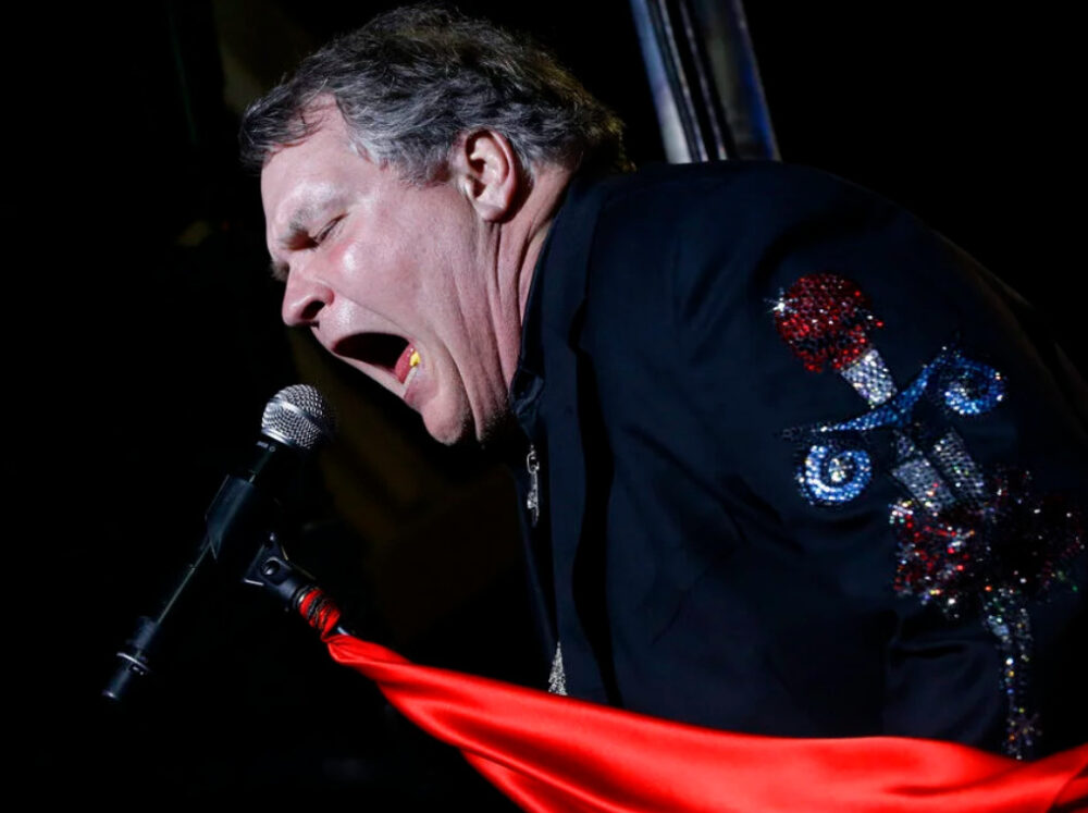 The singer Meat Loaf performing at a concert